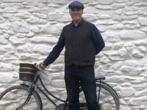 Mike bicycle in front of cottage Mike bicycle in front of cottage